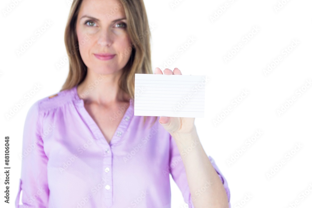 Portrait of a beautiful casual businesswoman showing a sign Portrait of a beautiful casual businesswoman showing a sign