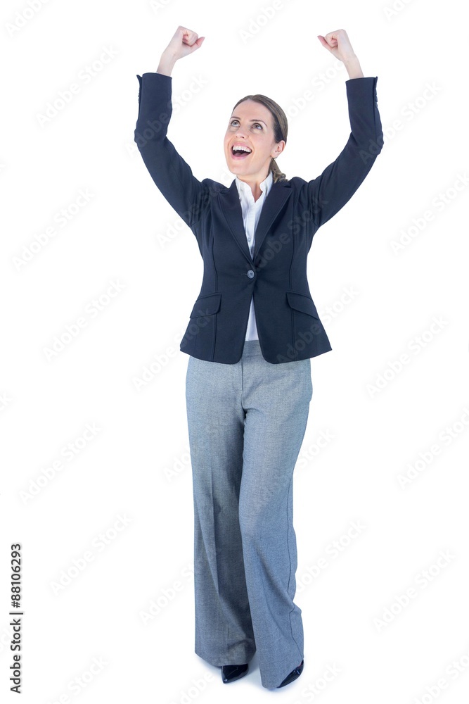 Businesswoman cheering with arms up Businesswoman cheering with arms up