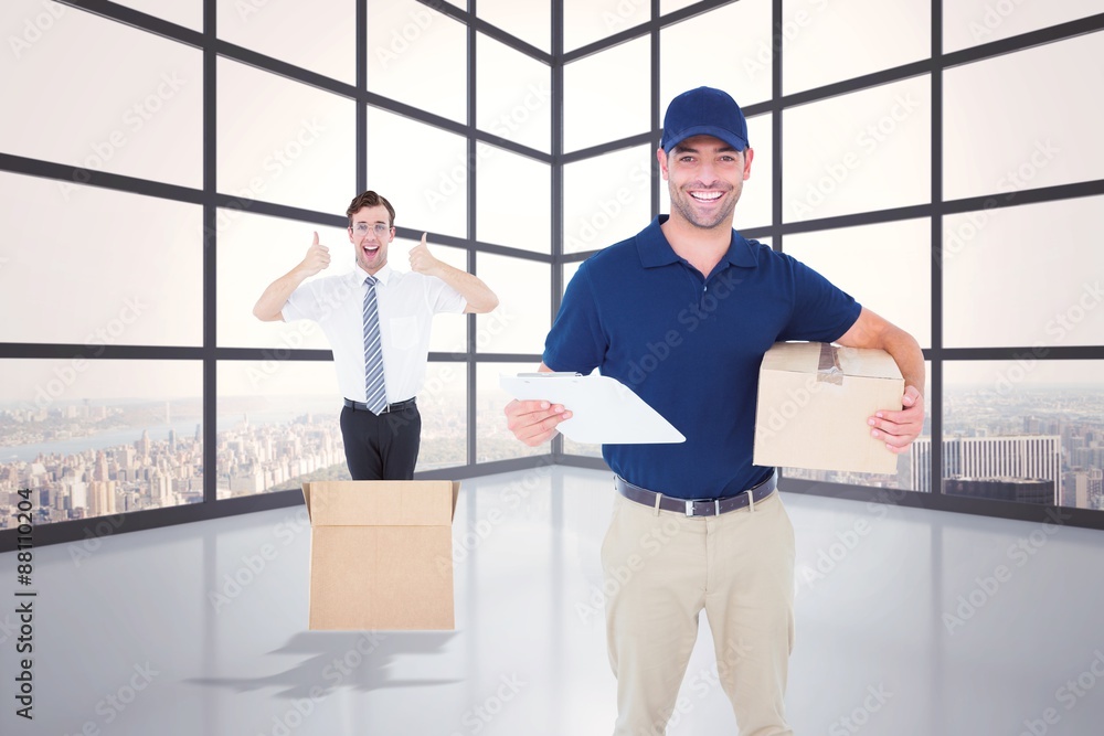 Composite image of happy delivery man with cardboard box Composite image of happy delivery man with cardboard box