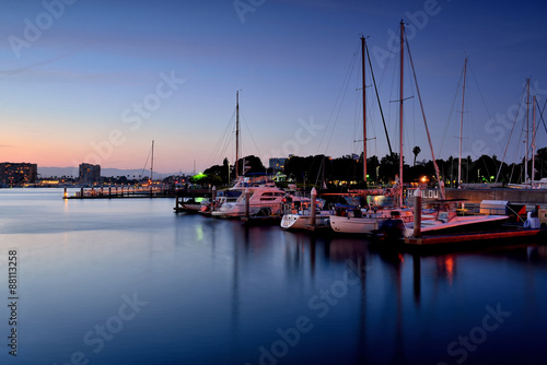 Boats moored in the harbour at sunset, Marina Del Rey, Los Angeles, California, USA photo