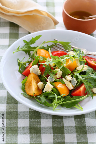 salad with tomatoes and arugula