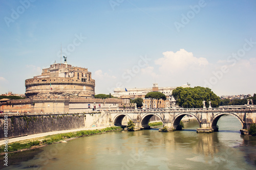 View on famous Saint Angel castle and bridge over the Tiber river in Rome, Italy