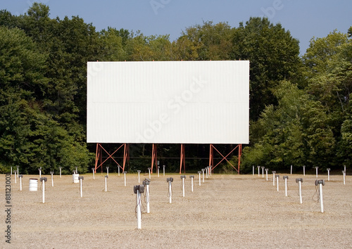 Retro Drive-In Movie Theater – A drive-in movie theater with speaker poles.