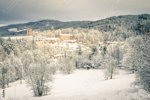 State Castle Rozmberk nad Vltavou south bohemia and church in the winter (snow)