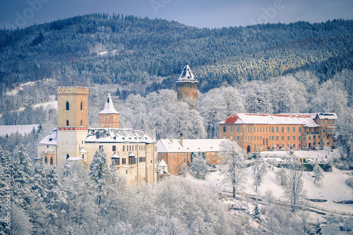 State Castle Rozmberk nad Vltavou south bohemia and church in the winter (snow) photo