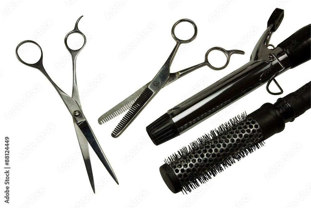 Hair Styling Tools – Hair styling scissors, curling iron and round brush.  Stock Photo | Adobe Stock