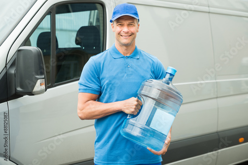 Delivery Man Holding Water Bottle