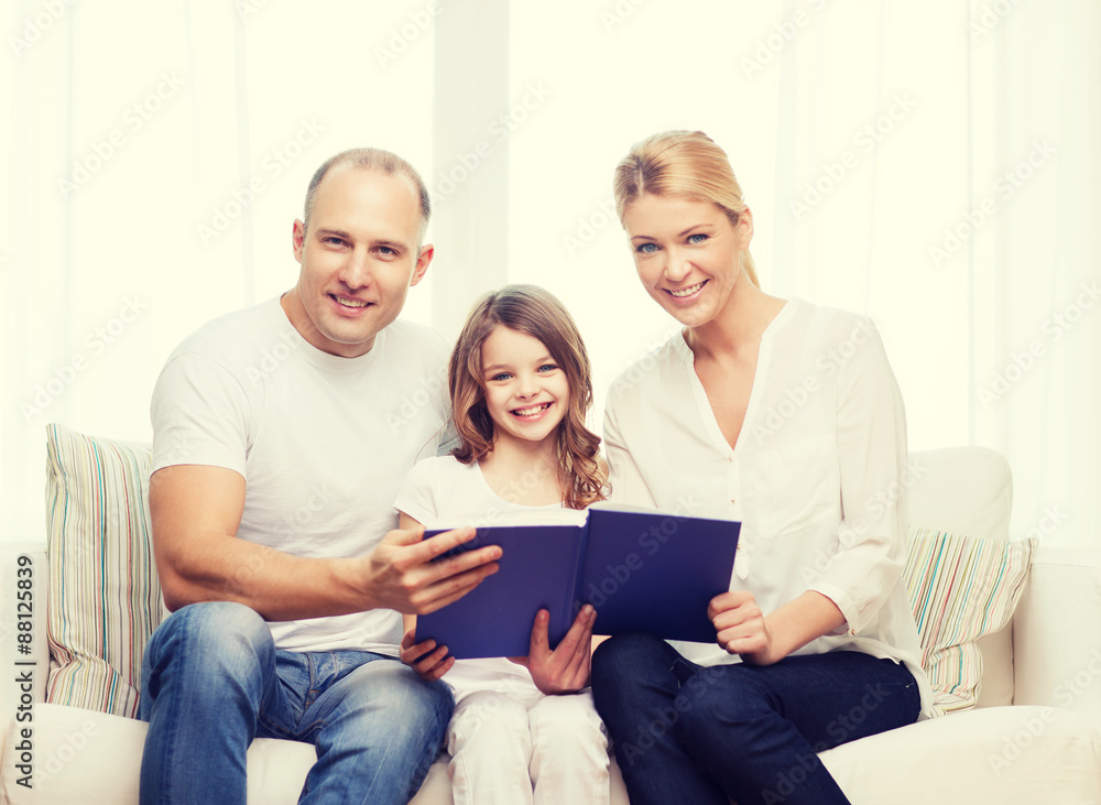 smiling parents and little girl with at home smiling parents and little girl with at home
