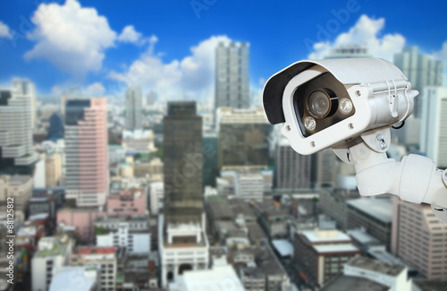 CCTV with Blurring City in background.