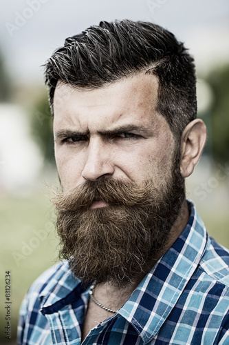 Portrait of serious man outdoor