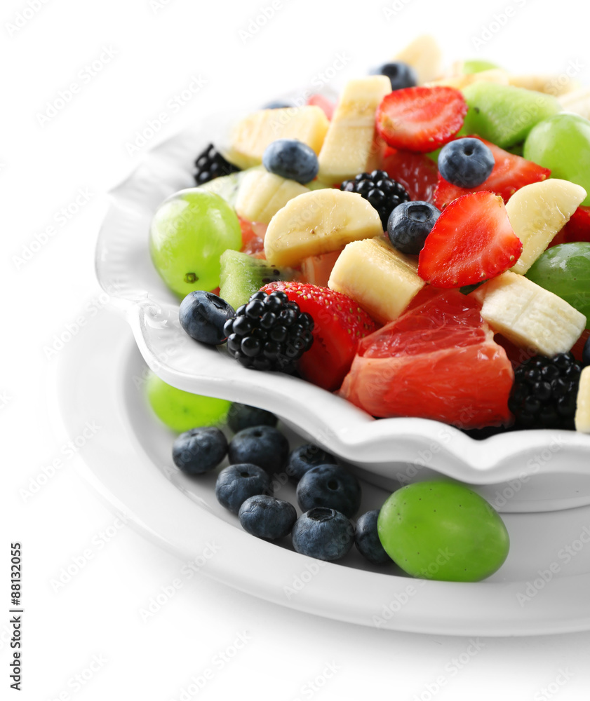 Fresh fruit salad, isolated on white Fresh fruit salad, isolated on white