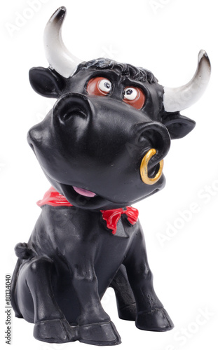 Isolated rubber cow figurine