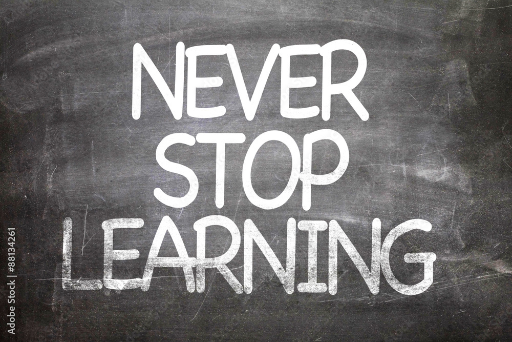 Never Stop Learning written on a chalkboard Never Stop Learning written on a chalkboard