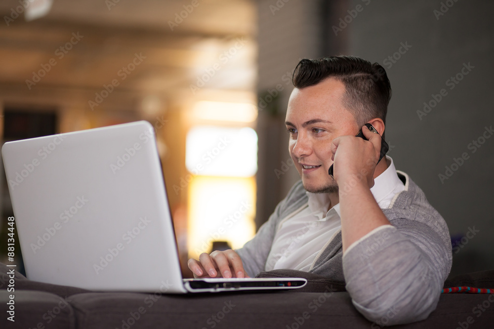 Trendy man working in startup office Trendy man working in startup office