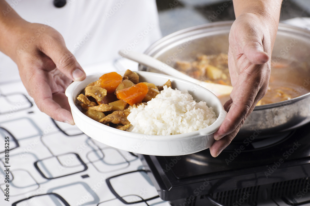 Chef presented Japanese pork curry with steam rice Chef presented Japanese pork curry with steam rice