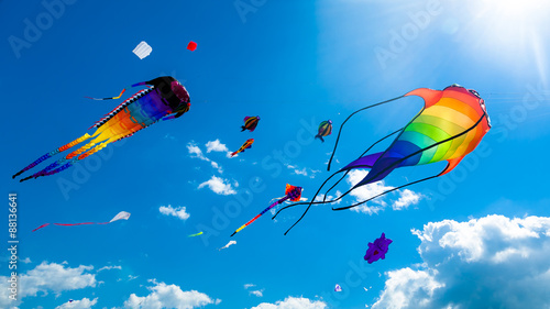 Various kites flying on the sky photo