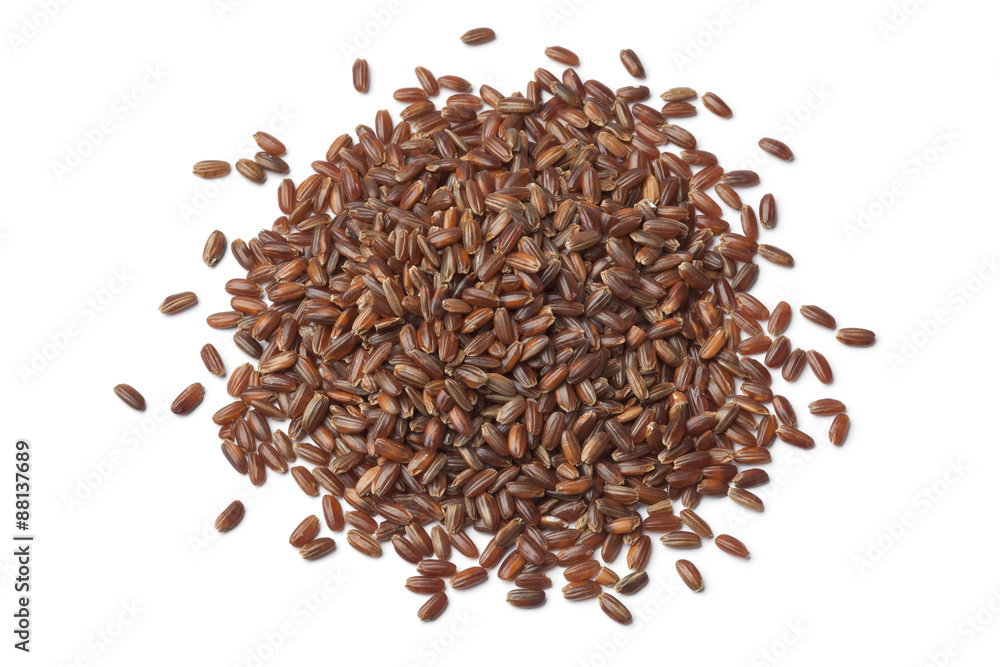 Heap of raw red rice Heap of raw red rice