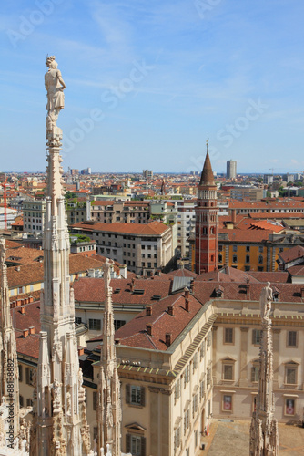 City roofs and belltower, view from Duomo. Milan, Italy © photobeginner
