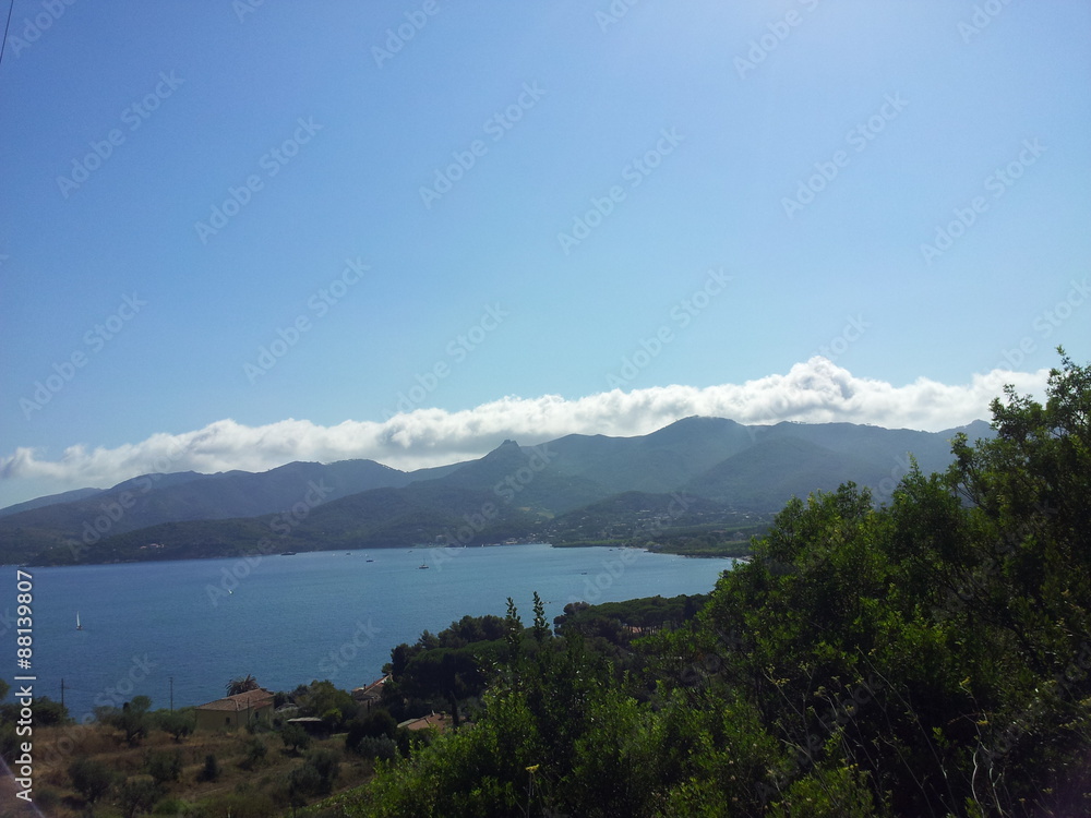 The hills, the clouds and the sea of Elba island, Italy.