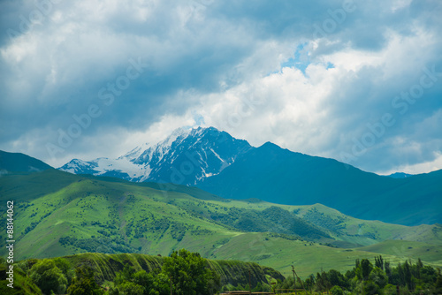 Beautiful blue-green mountains in the mist.Cloudy.Summer.The Caucasus. .Russia. photo