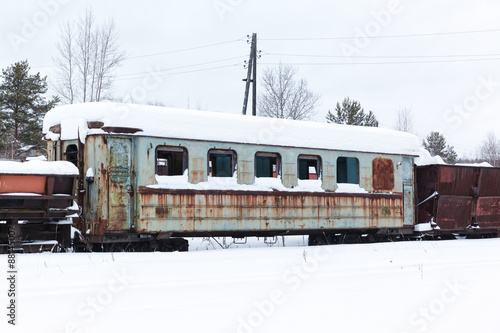 Abandoned rusty wagons on narrow-gauge railway