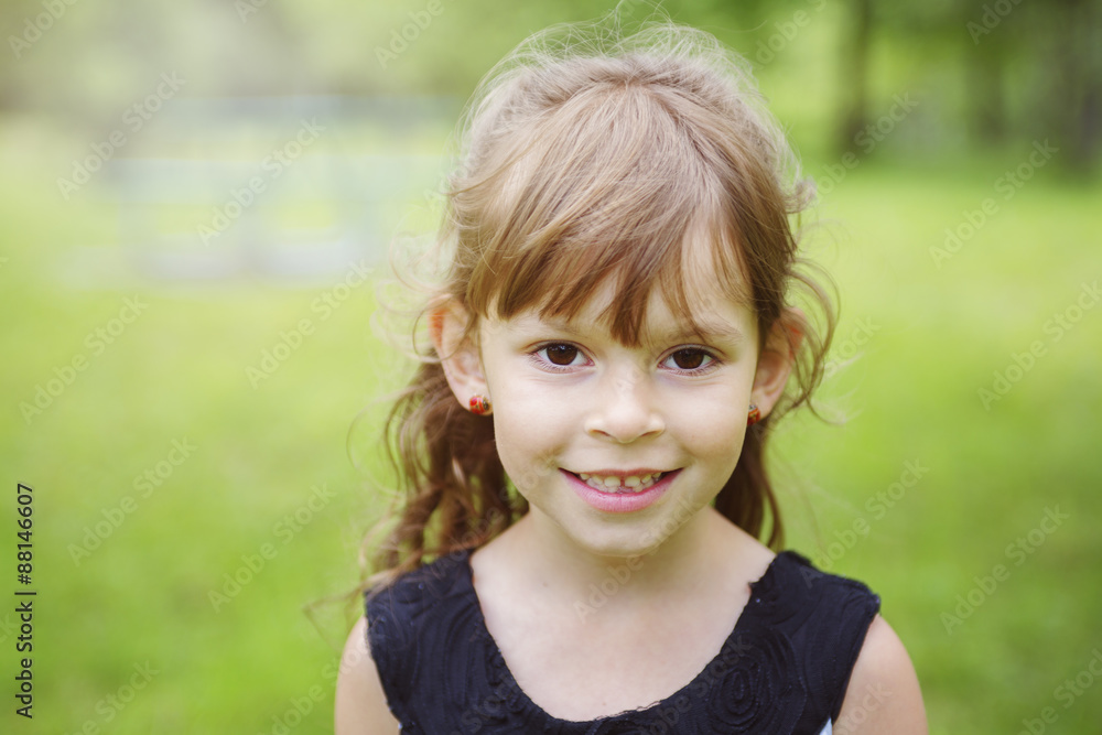 Adorable little girl in the forest meadow Adorable little girl in the forest meadow