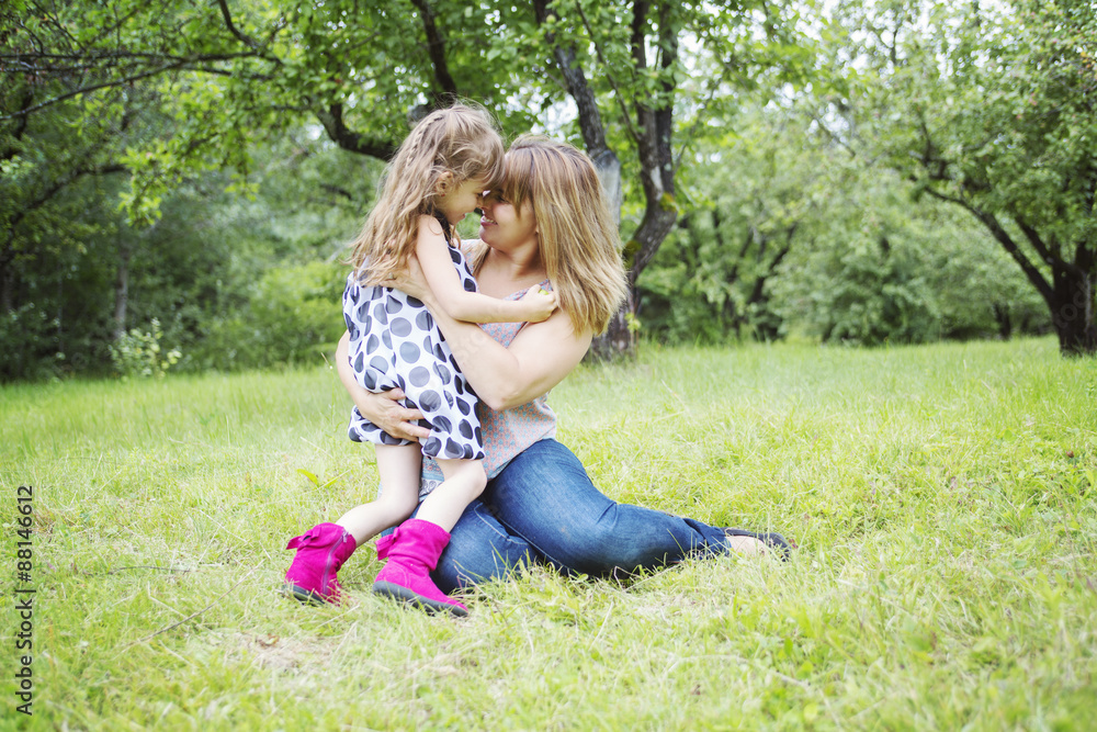 Mother and daughter in forest having fun Mother and daughter in forest having fun