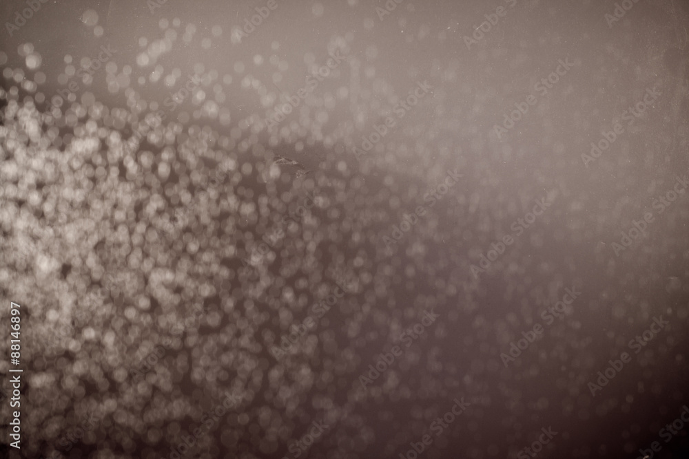 abstract dark bokhe lights background , purple,black and subtle gold. defocused background abstract dark bokhe lights background , purple,black and subtle gold. defocused background