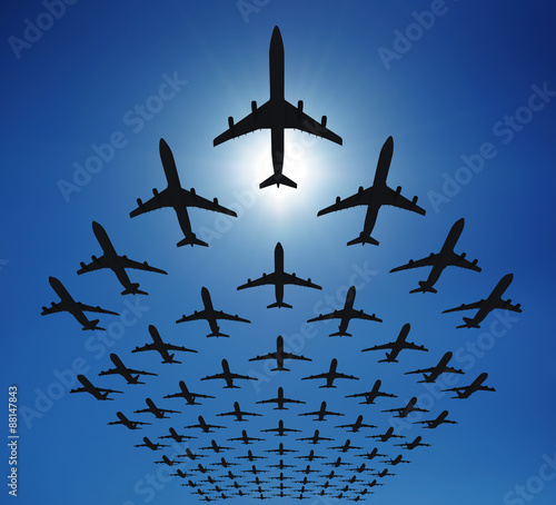 Airplane silhouettes in the sky