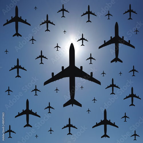 Airplane silhouettes in the sky