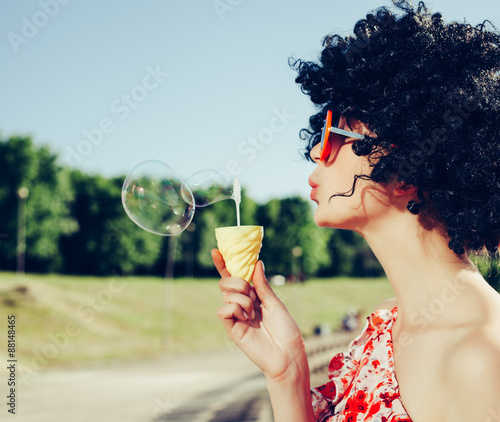 Vintage photo of soap bubble blower woman photo