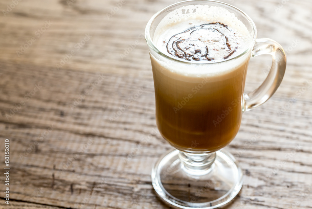 Glass mug with cappuccino Glass mug with cappuccino