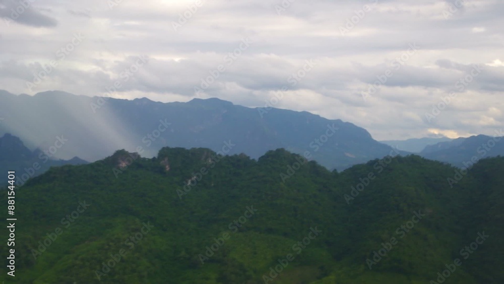 mountain and rain fall scene outside the plane window mountain and rain fall scene outside the plane window
