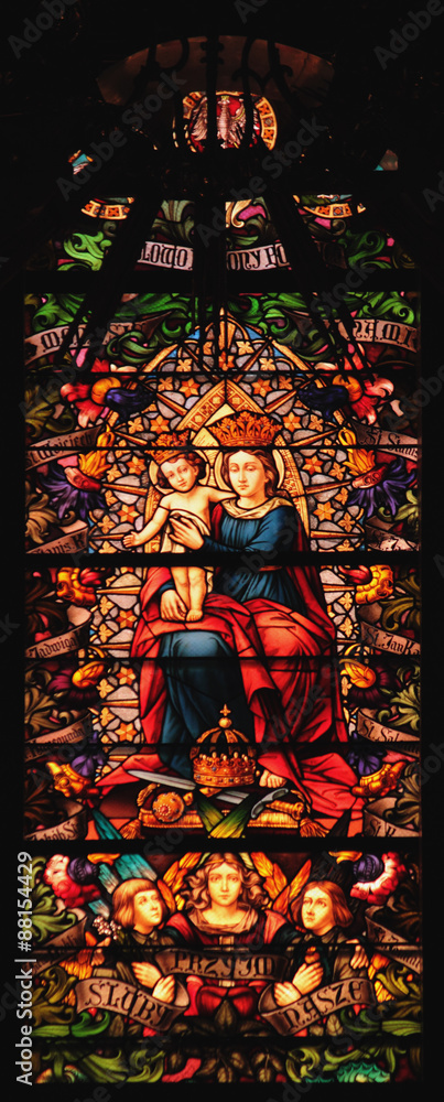 stained glass of the Virgin Mary with the baby Jesus Christ