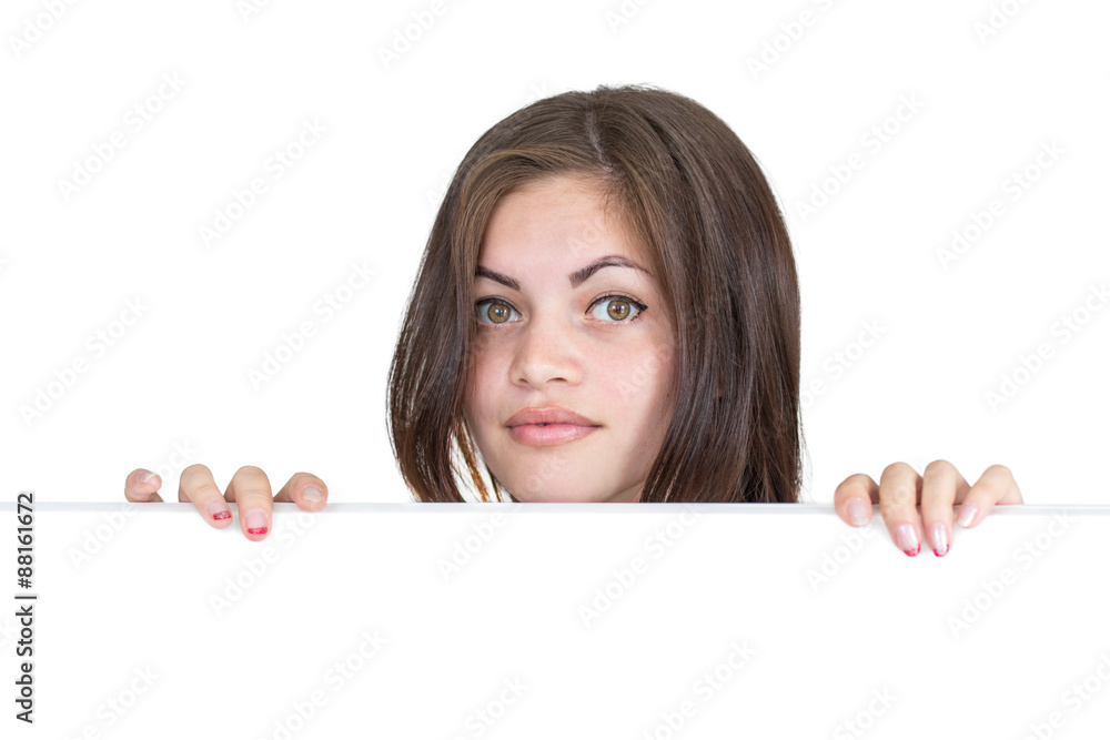 Girl peeks out from behind the screen Girl peeks out from behind the screen