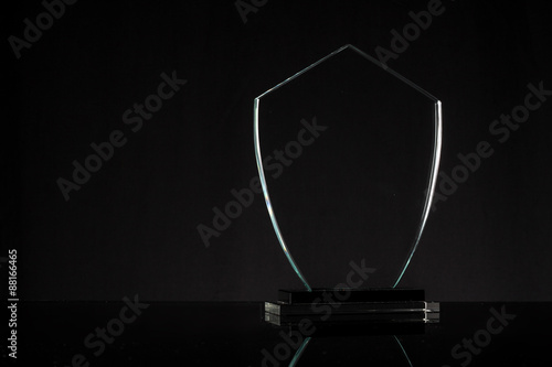 glass trophy in black background