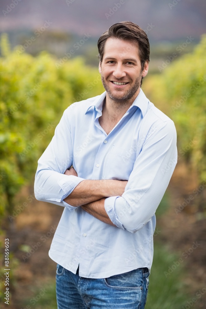 Happy vintner with crossed arms Happy vintner with crossed arms