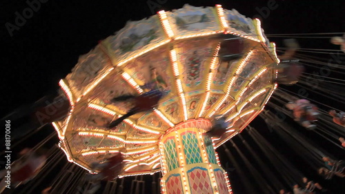 Midway Carnival Lights 15. Swing carnival ride at the CNE midway in Toronto, Canada. photo