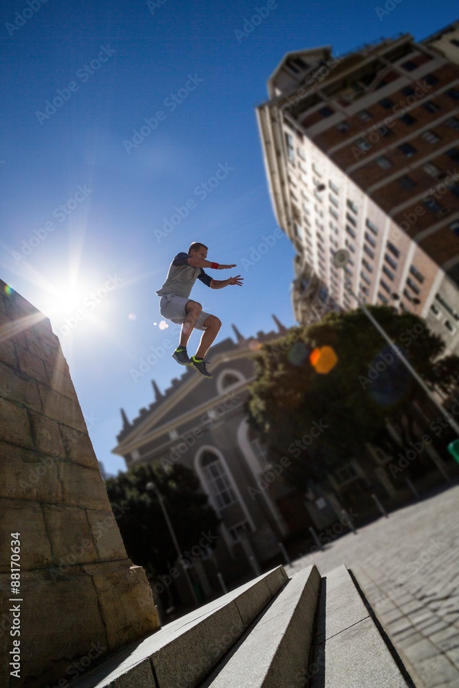 Extreme athlete jumping in the air