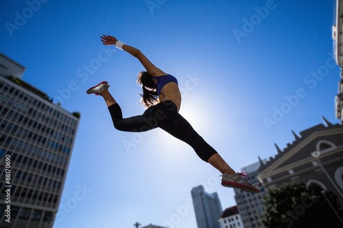 Athletic woman jumping in the air © WavebreakMediaMicro