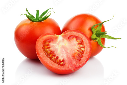 Red tomatoes with cut isolated on white