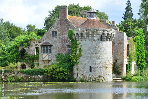 The ruins of an old English castle surrounded by a moat in Kent.