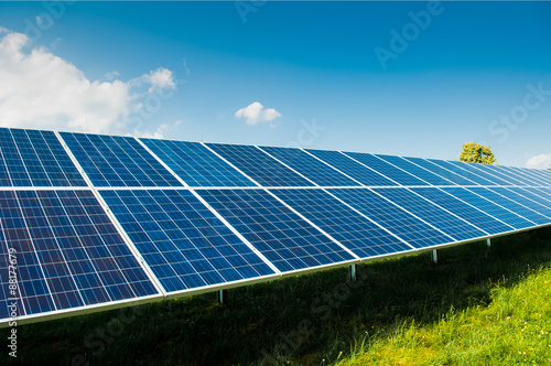 Solar power panels on blue sky and copy space