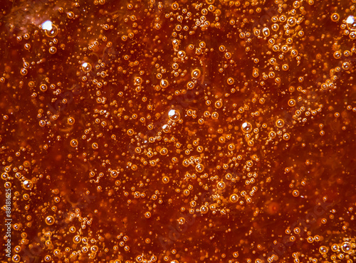 Texture is boiling yellow apricot jam