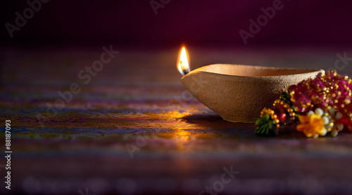 Traditional clay diya lamps lit during diwali celebration