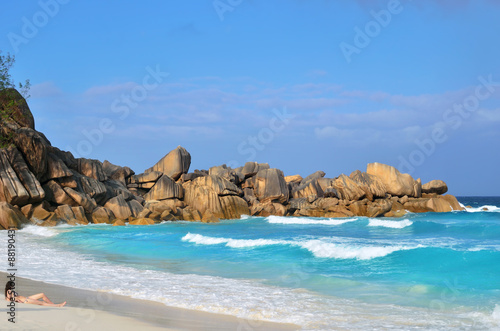 Warm evening at sandy beach during sunset. Seychelles, La Digue, Anse Cocos 