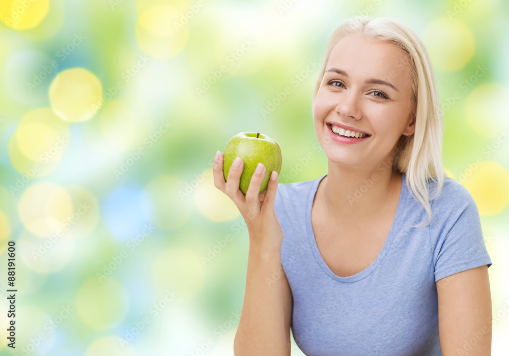 happy woman eating green apple happy woman eating green apple