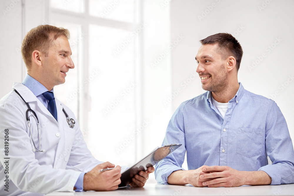 © Syda Productions - male doctor and patient with clipboard at hospital © Syda Productions - male doctor and patient with clipboard at hospital