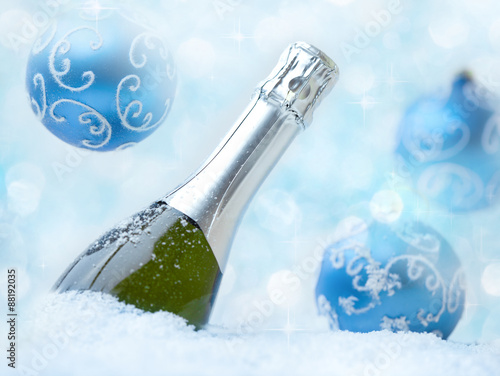 Christmas champagne on snow photo