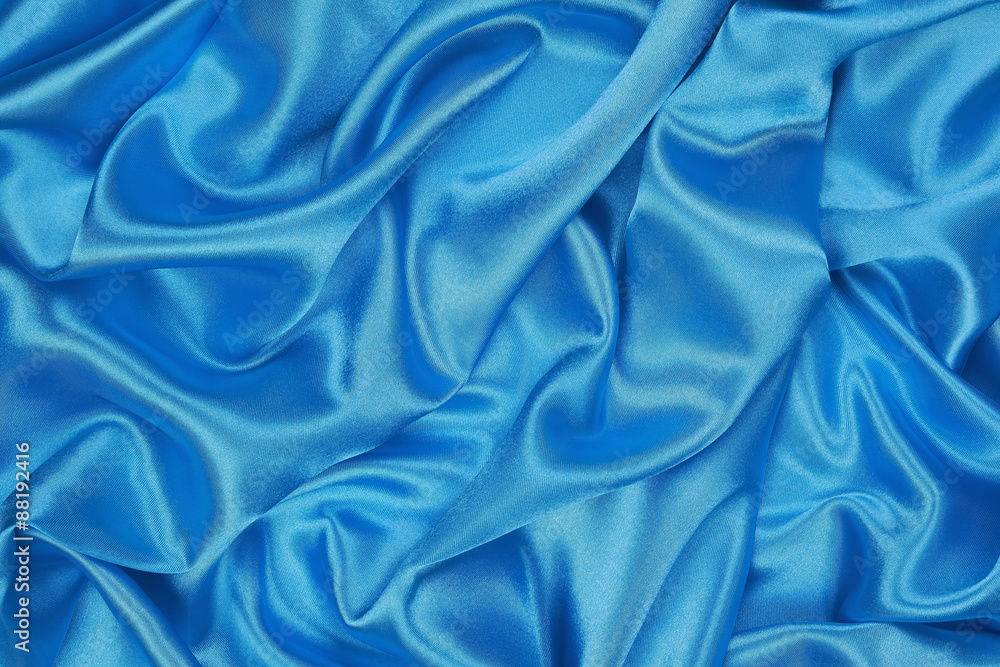 Obraz premium Blue Silk cloth of wavy abstract background